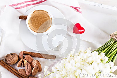 espresso, heart and bouquet of flowers Stock Photo
