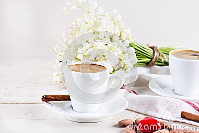 espresso, heart and bouquet of flowers Stock Photo