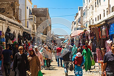 ESSAOUIRA, MOROCCO - AUGUST 17: traditional souk with walking people in medina Essaouira. The complete old town of Editorial Stock Photo