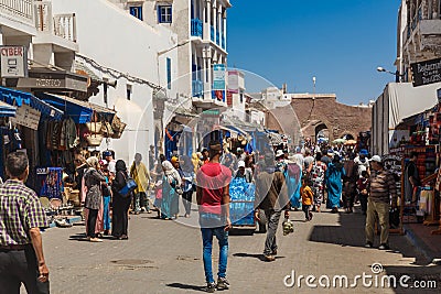 ESSAOUIRA, MOROCCO - NOVEMBER 18: traditional souk with walking people in medina Essaouira. The complete old town of Editorial Stock Photo