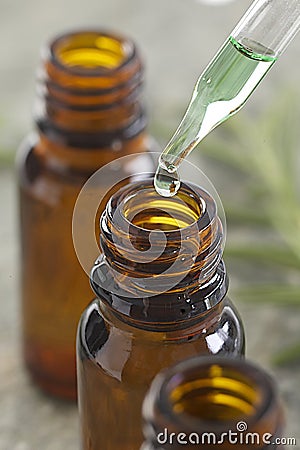 Essential oils - Drop down a pipette Stock Photo