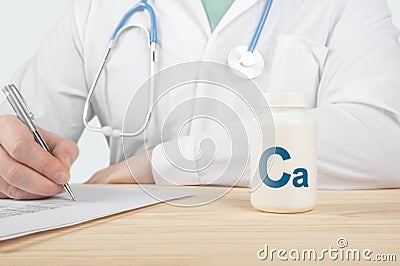 Essential supplement calcium Ca for bone humans. doctor recommends taking calcium. doctor talks about Benefits of calcium. Calcium Stock Photo