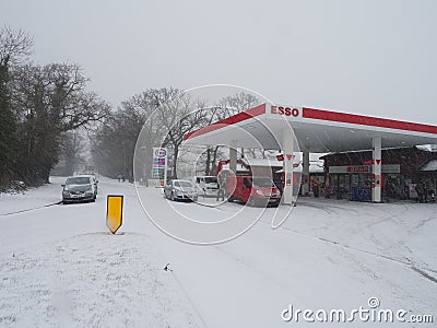 An Esso petrol station in the snow Editorial Stock Photo