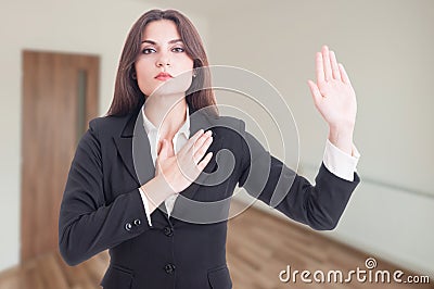 Estate broker swearing or telling the truth Stock Photo