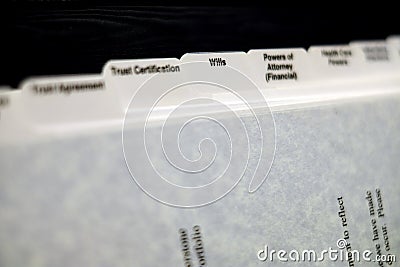 Estate Planning Documents with Tabs for Wills Power of Attorney and Trust Stock Photo