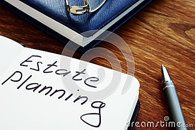 Estate planning handwriting sign on the sheet Stock Photo