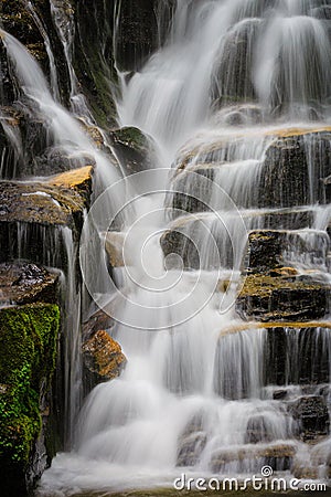 Estatoe Falls, a stairstep style of waterfall, in Rosman, NC.CR2 Stock Photo