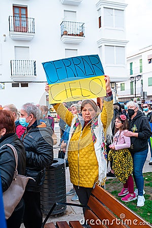 Estepona, Andalusia, Spain - March. 05, 2022. Protestors rally in support of Ukraine against russian agression. Anti-war Editorial Stock Photo