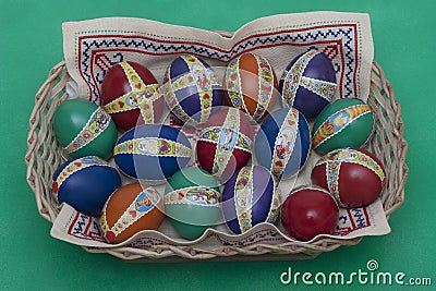 Ester eggs with decoration in basket Stock Photo