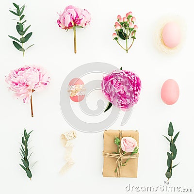 Ester holiday composition with eggs, pink peonies, hypericum and eucalyptus on white background. Flat lay Stock Photo