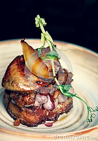 Foie gras with apple and pear chutney on the toast Stock Photo