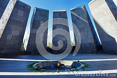 Eternal flame in Tsitsernakaberd - memorial dedicated to the victims of the Armenian Genocide. Yerevan, Armenia. The eternal flame Editorial Stock Photo