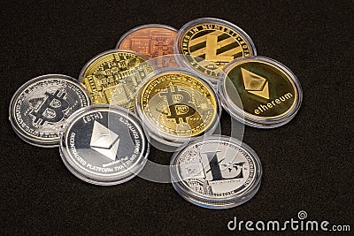 Ethereum and Bitcoin coins currency finance money stack together. Crypto currency background with various of shiny silver and gold Editorial Stock Photo