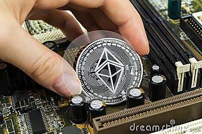 Ethereum classic is a modern way of exchange and this crypto currency is a convenient means of payment in the financial Editorial Stock Photo