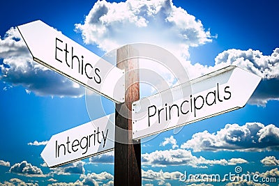 Ethics, principals, integrity concept - signpost with three arrows Stock Photo