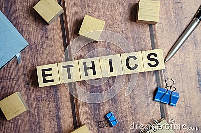 Ethics - words from wooden blocks with letters, ethics moral philosophy concept, white background Stock Photo