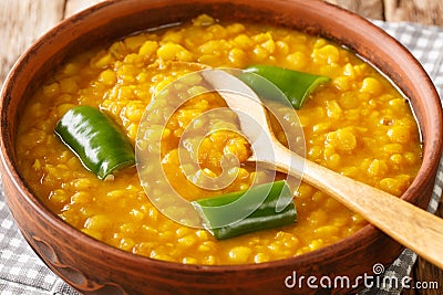 Ethiopian Split Pea stew Kik Alicha Vegan Glutenfree closeup in the bowl. Horizontal Stock Photo