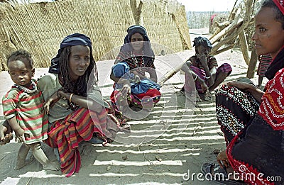 Ethiopian women with children in the desert Editorial Stock Photo