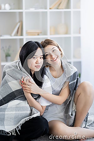 ethnic friendship happy women home meeting Stock Photo