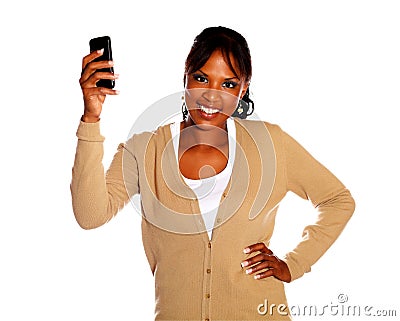 Ethnic young woman holding up her cellphone Stock Photo