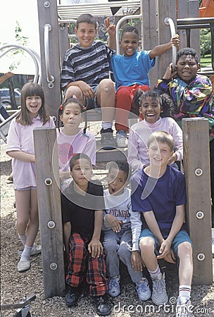 Ethnically diverse group of children in a city park, Chicago, IL Editorial Stock Photo