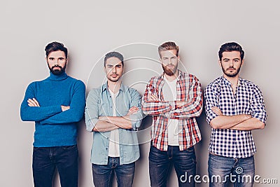 Ethnicity, multicultural diversity. Four serious harsh men are s Stock Photo