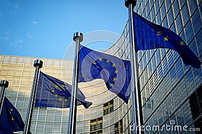 EU flags in front of European Commission Stock Photo