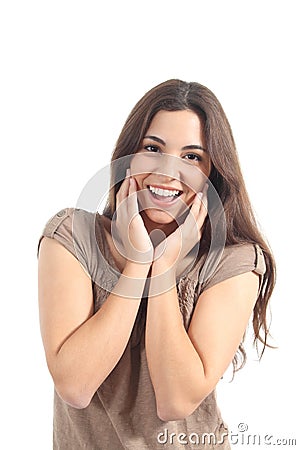 Euphoric woman expression with her hands on the face Stock Photo