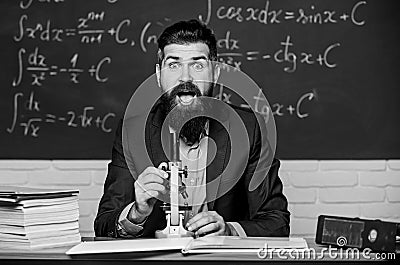 Eureka. Bearded man do science research. University teacher in research laboratory. Using microscope for important Stock Photo
