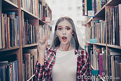 Eureka! Have an idea! Success concept. Young cute female student Stock Photo