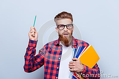 Eureka! Success and science concept. Nerdy young red bearded stu Stock Photo