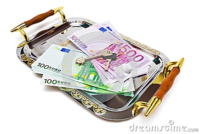 Euro bank notes and keys on a metal tray Stock Photo