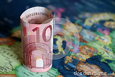Euro banknote on the Europe map Stock Photo