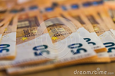 Euro banknotes spread on the table, close-up, horizontal, blurred Stock Photo