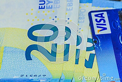 Euro banknotes and visa card Editorial Stock Photo