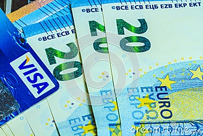 Euro banknotes and visa card Editorial Stock Photo