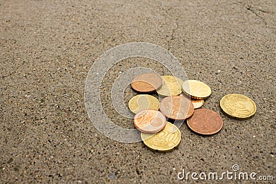 Euro cents on the cement road Stock Photo