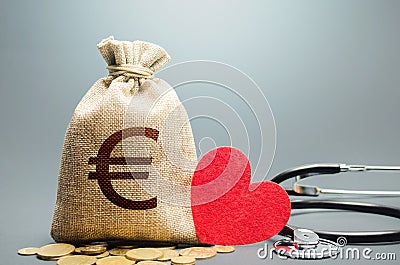 Euro money bag and stethoscope. Health life insurance and financing concept. Subsidies, investments. Funding healthcare system. Stock Photo