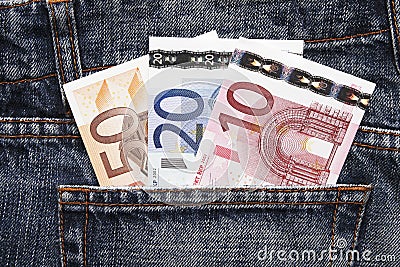 Euro Pocket Money In Blue Jeans Stock Photo