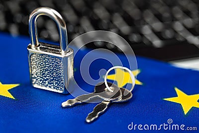 Europe cyber security concept. Padlock on computer keyboard and EU flag. Close-up view photo Stock Photo