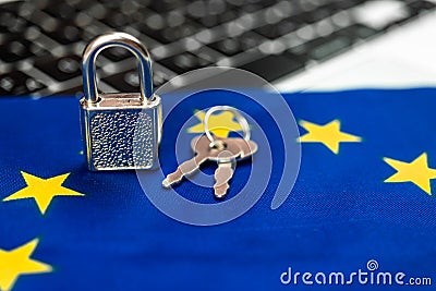 Europe cyber security concept. Padlock on computer keyboard and EU flag. Close-up view photo Stock Photo