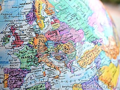 Europe focus macro shot on globe map for travel blogs, social media, website banners and backgrounds. Stock Photo