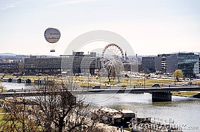 Europe, Krakow, Poland, Vistula River Hotel Forum boulevard river bank panorama, cityscape. Balloon, ferris wheel, wide city view Editorial Stock Photo