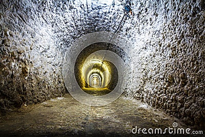 Lights in a mine salt tunnel Stock Photo