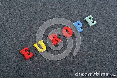 EUROPE word on black board background composed from colorful abc alphabet block wooden letters, copy space for ad text Stock Photo