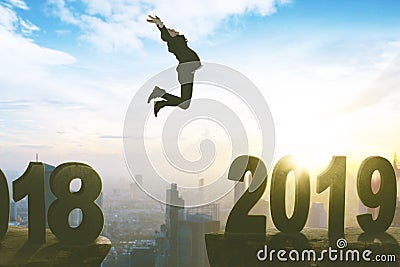 European businessman leaps toward number 2019 Stock Photo