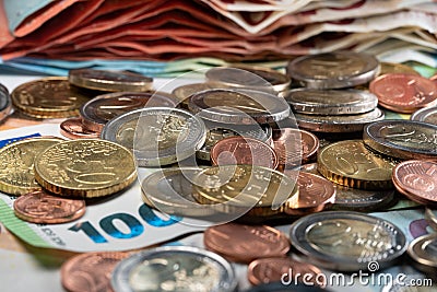 European currency, Euro coins on top of banknotes. Bailout money in Europe Stock Photo