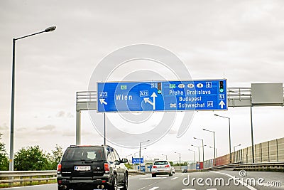 European highway sign - direction and exit sign to Praha, Bratislava and Budapest Wien Editorial Stock Photo