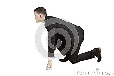 European male manager kneeling on studio Stock Photo