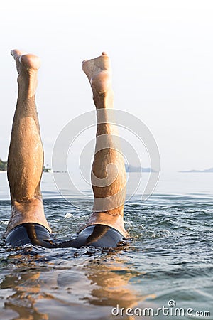 A European man diving underwater at Koh Mak, Tra Stock Photo